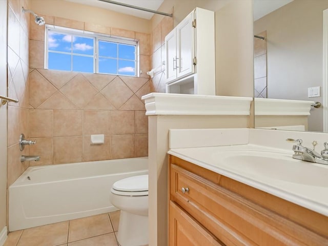 full bathroom with tile patterned flooring, bathing tub / shower combination, toilet, and vanity