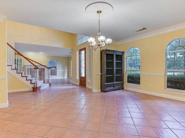 empty room featuring stairway, light tile patterned floors, baseboards, visible vents, and a notable chandelier