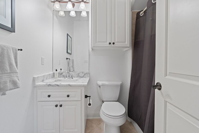 bathroom featuring toilet, tile patterned floors, vanity, baseboards, and a shower with curtain