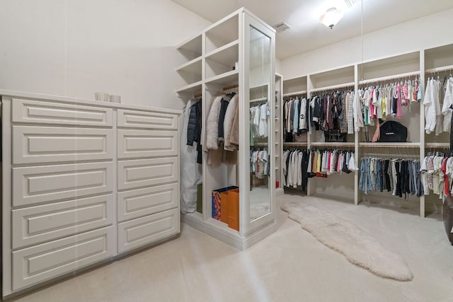 walk in closet with carpet and visible vents