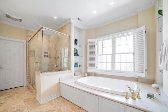 bathroom featuring a wealth of natural light, visible vents, and crown molding