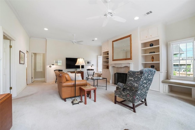 living room with a fireplace, recessed lighting, visible vents, light carpet, and ceiling fan