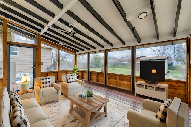 sunroom with lofted ceiling with beams