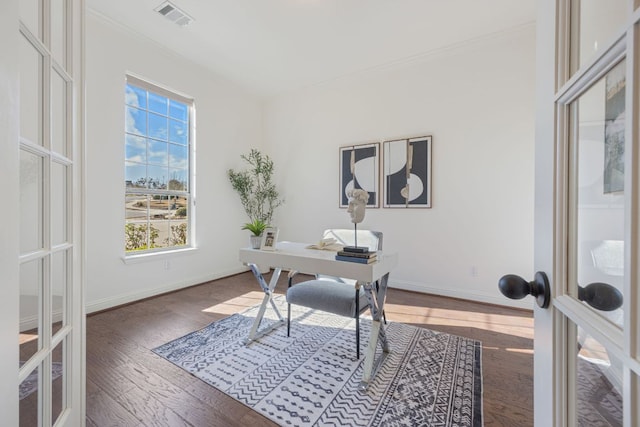 office with french doors, wood finished floors, visible vents, and baseboards