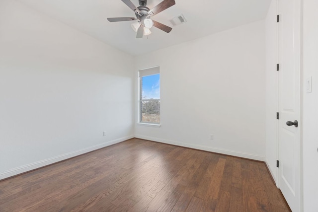 unfurnished bedroom with ceiling fan, wood finished floors, visible vents, and baseboards