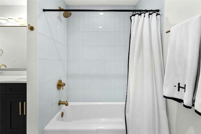 bathroom with shower / bath combo and vanity