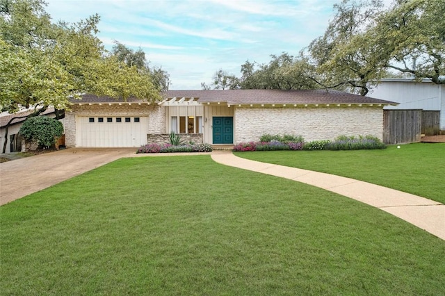 view of front facade featuring an attached garage, concrete driveway, stone siding, and a front yard