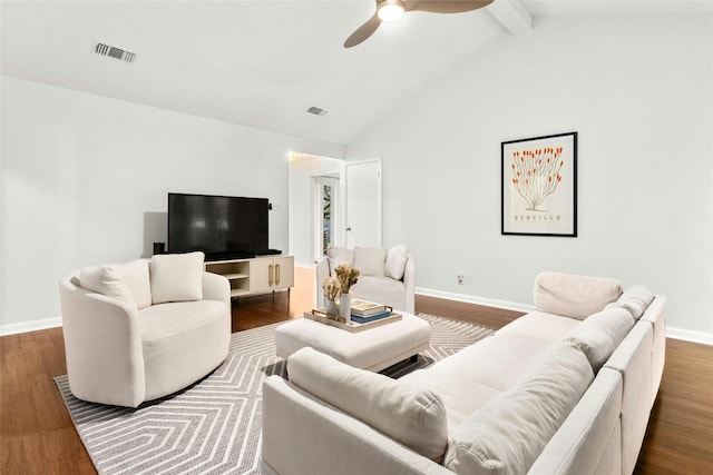 living room with vaulted ceiling with beams, wood finished floors, a ceiling fan, visible vents, and baseboards