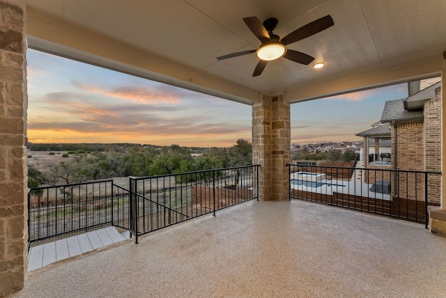 balcony featuring a ceiling fan