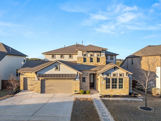 view of front of house featuring stone siding, concrete driveway, an attached garage, and stucco siding