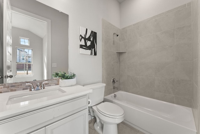 full bath featuring shower / washtub combination, lofted ceiling, vanity, and toilet