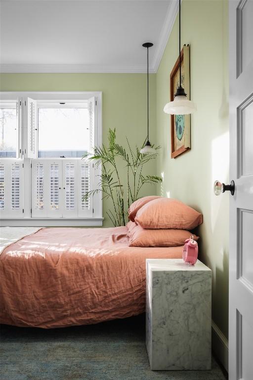 bedroom featuring ornamental molding