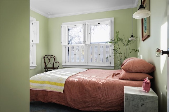 bedroom with ornamental molding