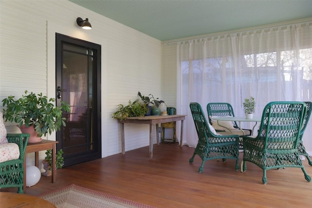 home office featuring wood finished floors and a wealth of natural light