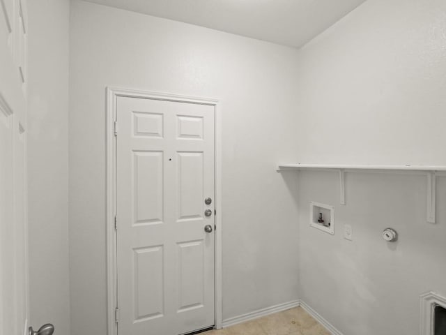 laundry area featuring gas dryer hookup, laundry area, baseboards, and washer hookup