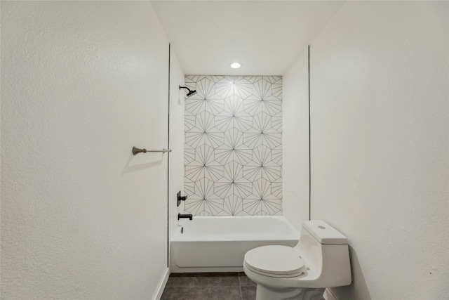 full bathroom with toilet, tub / shower combination, and tile patterned floors