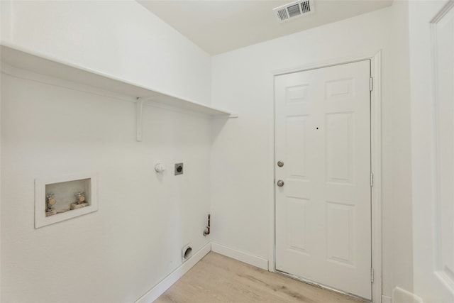 laundry room featuring light wood-style flooring, hookup for an electric dryer, laundry area, washer hookup, and visible vents