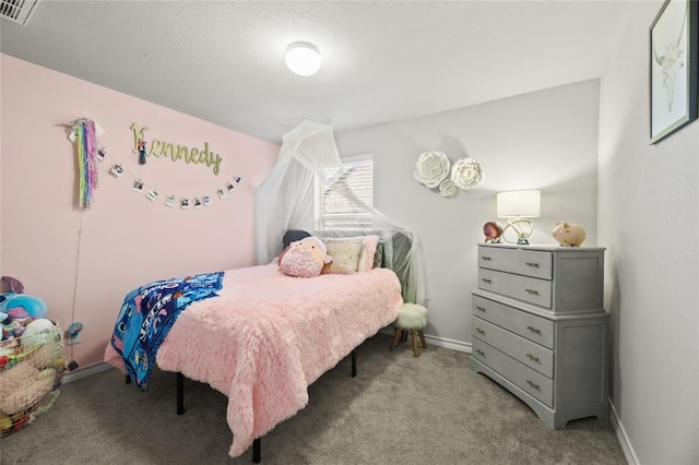 bedroom with carpet flooring, visible vents, and baseboards