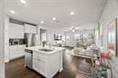 kitchen featuring breakfast area, a sink, and stainless steel dishwasher