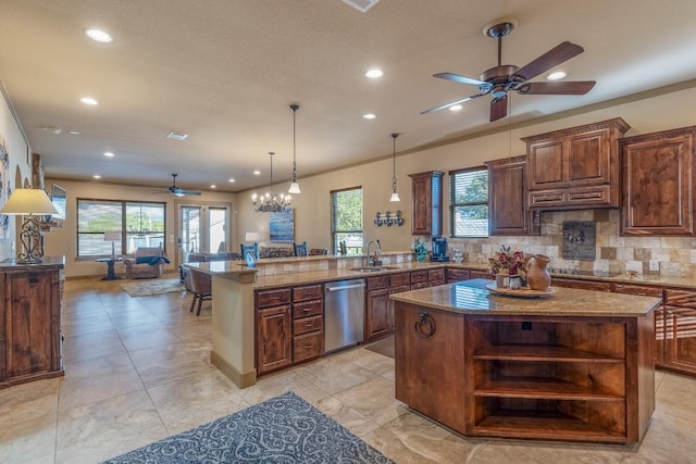 kitchen with tasteful backsplash, open floor plan, a peninsula, open shelves, and stainless steel dishwasher