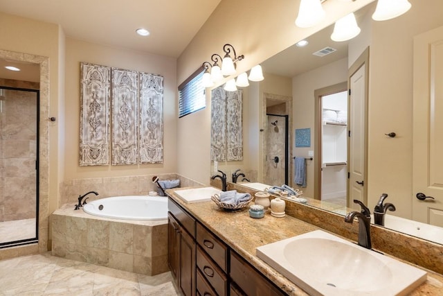 full bathroom with a bath, a stall shower, visible vents, and a sink