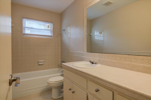 full bath with visible vents, toilet, shower / bathtub combination, tile patterned floors, and vanity