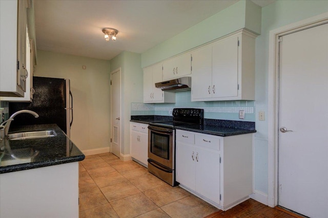 kitchen with white cabinets, decorative backsplash, stainless steel electric range, under cabinet range hood, and a sink