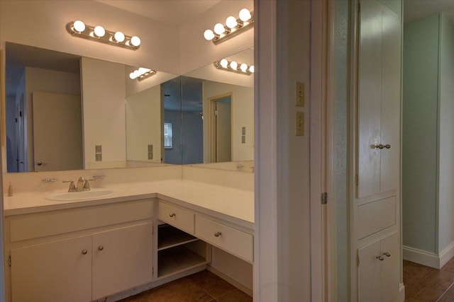 bathroom featuring tile patterned floors and vanity