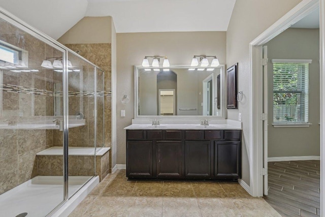2629 Estefania Ln, Round Rock, TX 78665 - full bathroom with double vanity, a stall shower, and baseboards