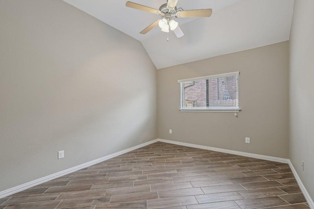 2629 Estefania Ln, Round Rock, TX 78665 - spare room featuring wood finish floors, baseboards, a ceiling fan, and lofted ceiling