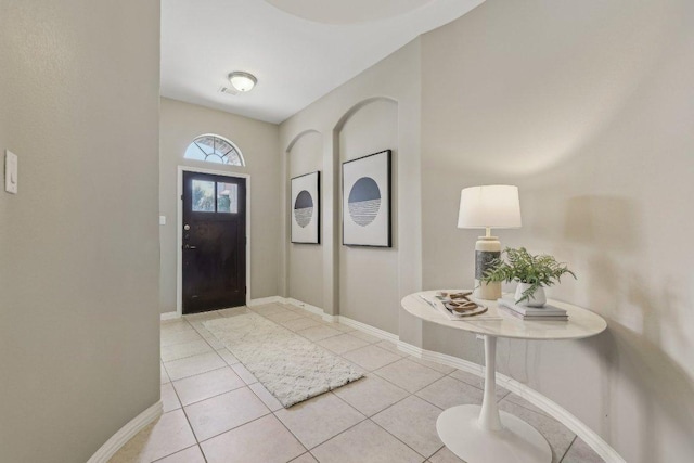 2629 Estefania Ln, Round Rock, TX 78665 - entrance foyer with light tile patterned floors and baseboards