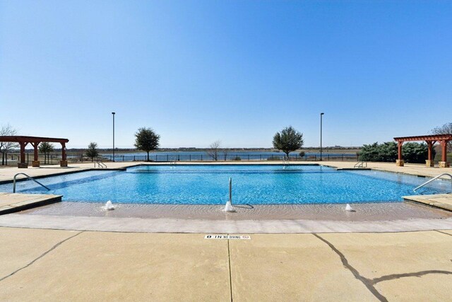 2629 Estefania Ln, Round Rock, TX 78665 - community pool featuring a gazebo, a pergola, and a patio area