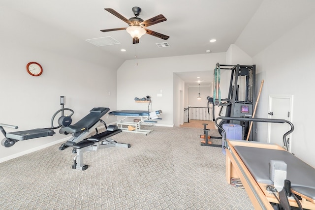 workout area with lofted ceiling, carpet, visible vents, and baseboards