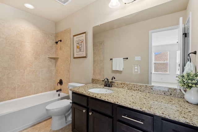 full bathroom featuring toilet, tile patterned flooring,  shower combination, and vanity