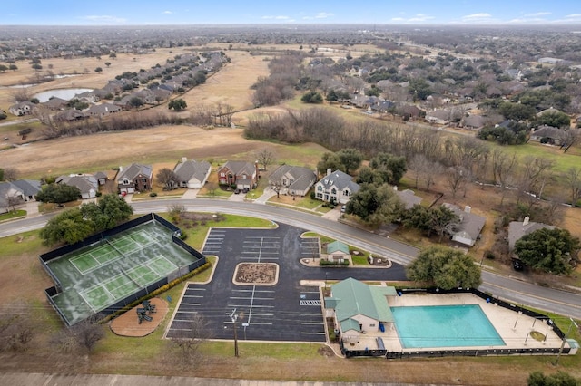 birds eye view of property with a residential view