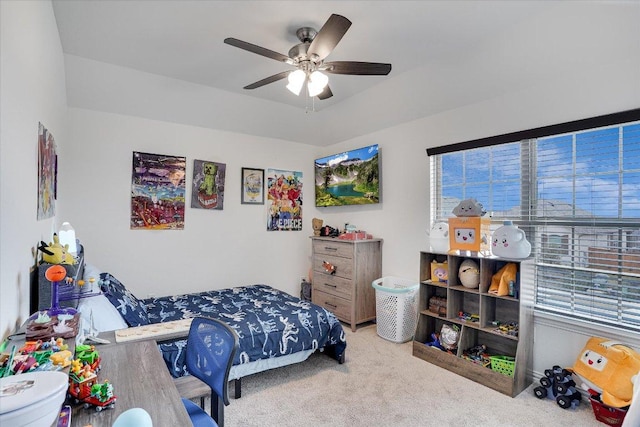 bedroom with ceiling fan and carpet flooring