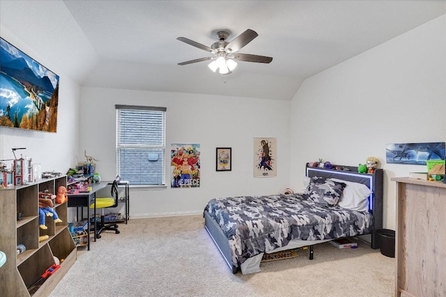 bedroom featuring lofted ceiling, ceiling fan, baseboards, and carpet flooring