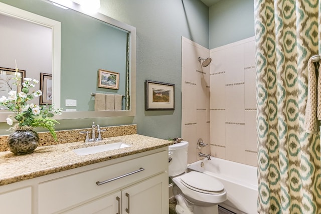 bathroom featuring shower / tub combo with curtain, vanity, and toilet