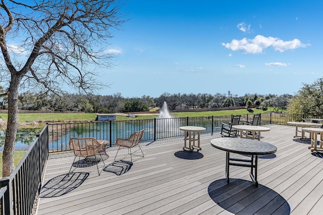 deck featuring a water view