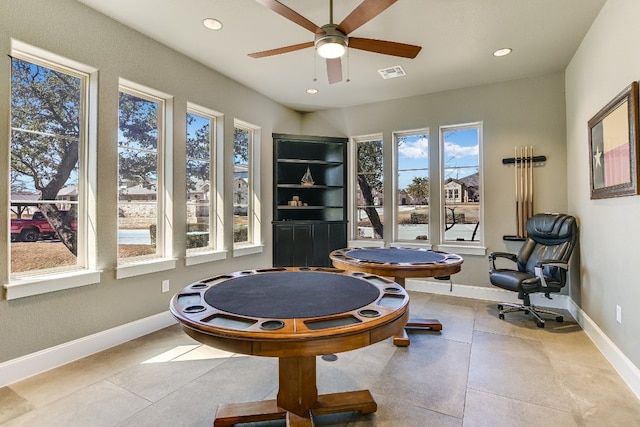 recreation room featuring a ceiling fan, recessed lighting, visible vents, and baseboards