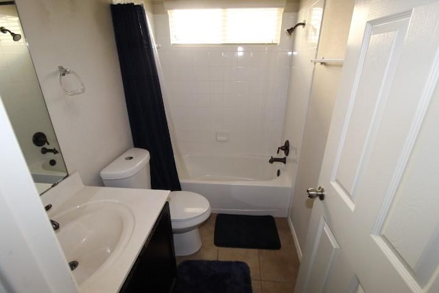 full bathroom featuring toilet, tile patterned flooring, shower / tub combo with curtain, and vanity