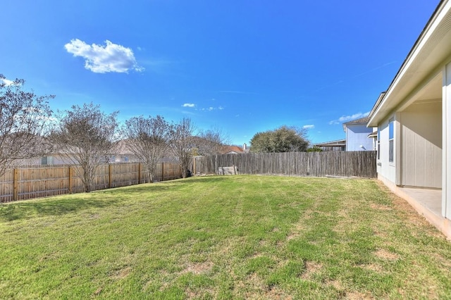 view of yard featuring a fenced backyard