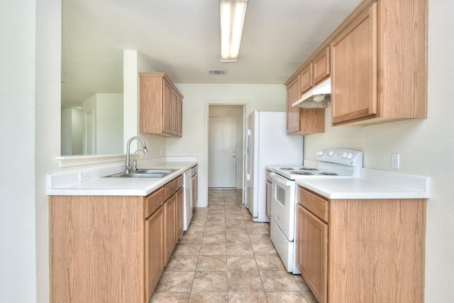 kitchen featuring white appliances, visible vents, light countertops, under cabinet range hood, and a sink