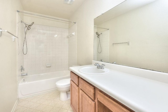 full bathroom featuring toilet, tile patterned floors,  shower combination, and vanity