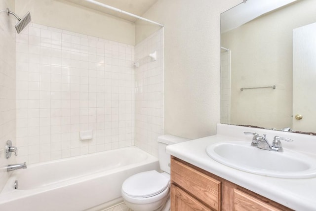 bathroom with shower / bathtub combination, vanity, and toilet