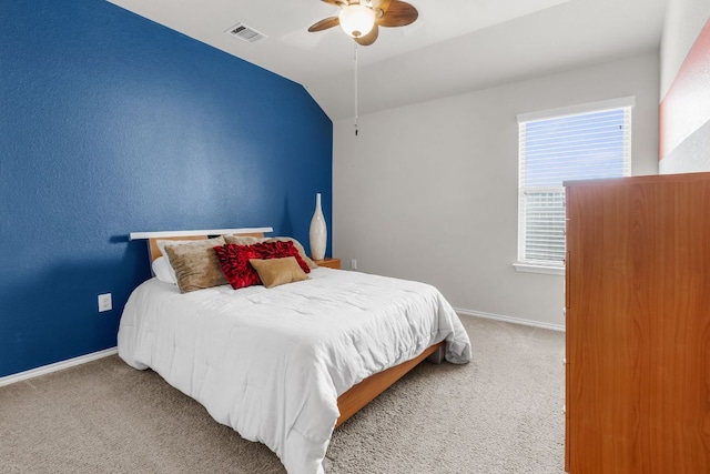 bedroom featuring carpet floors, visible vents, vaulted ceiling, and baseboards