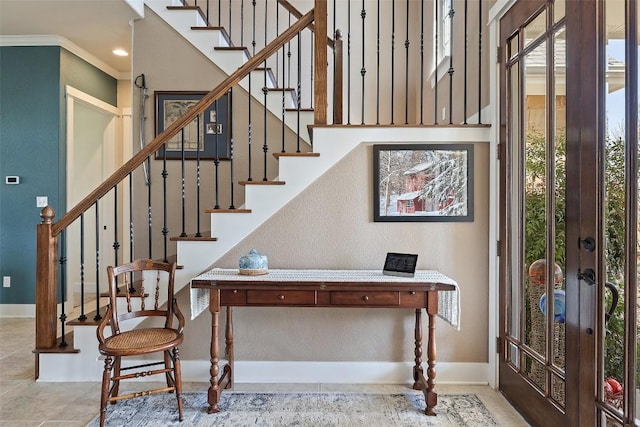 tiled entryway featuring stairway, baseboards, and french doors