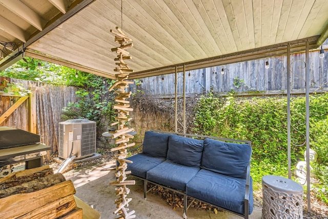 view of patio featuring fence and central air condition unit