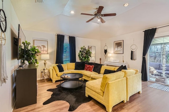 living room with baseboards, a ceiling fan, wood finished floors, vaulted ceiling, and recessed lighting