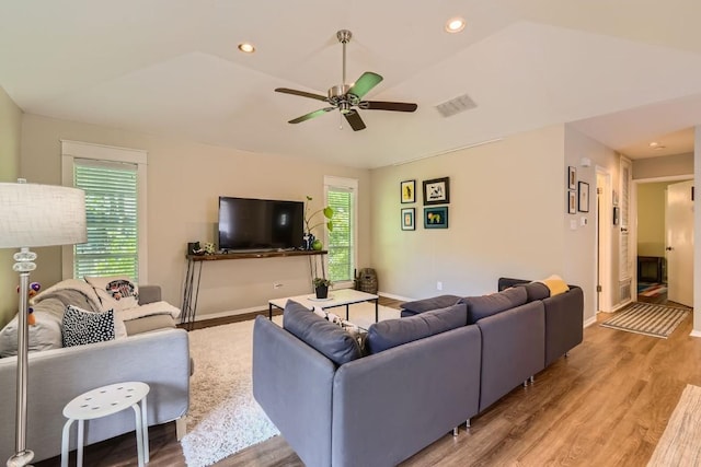 3404 S Oak Dr, Austin, TX 78704 - living area with ceiling fan, healthy amount of natural light, light wood-type flooring, baseboards, and lofted ceiling